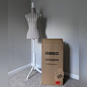 Mannequin torso on tripod